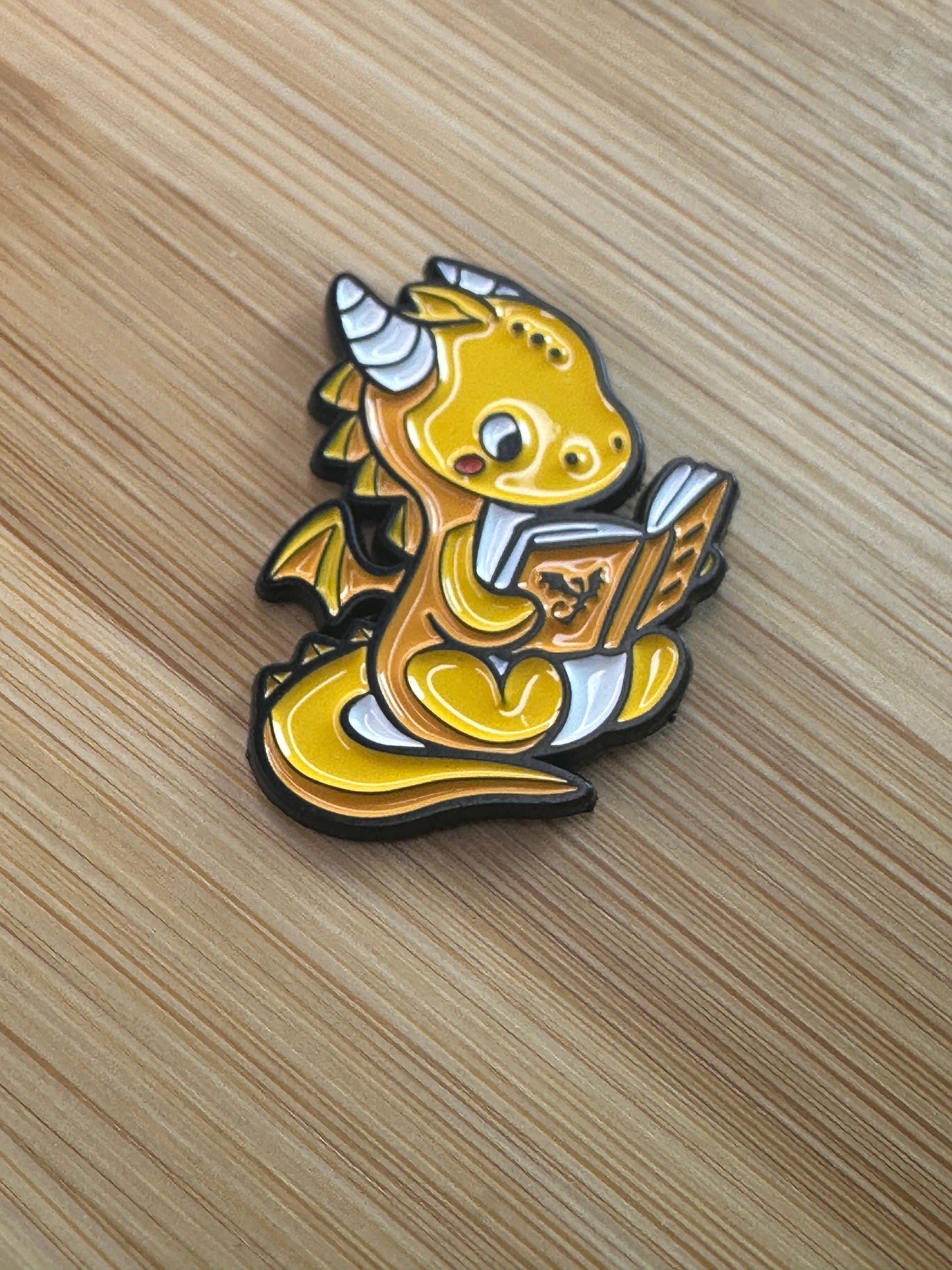 Golden Baby Dragon Reading - Enamel Pin