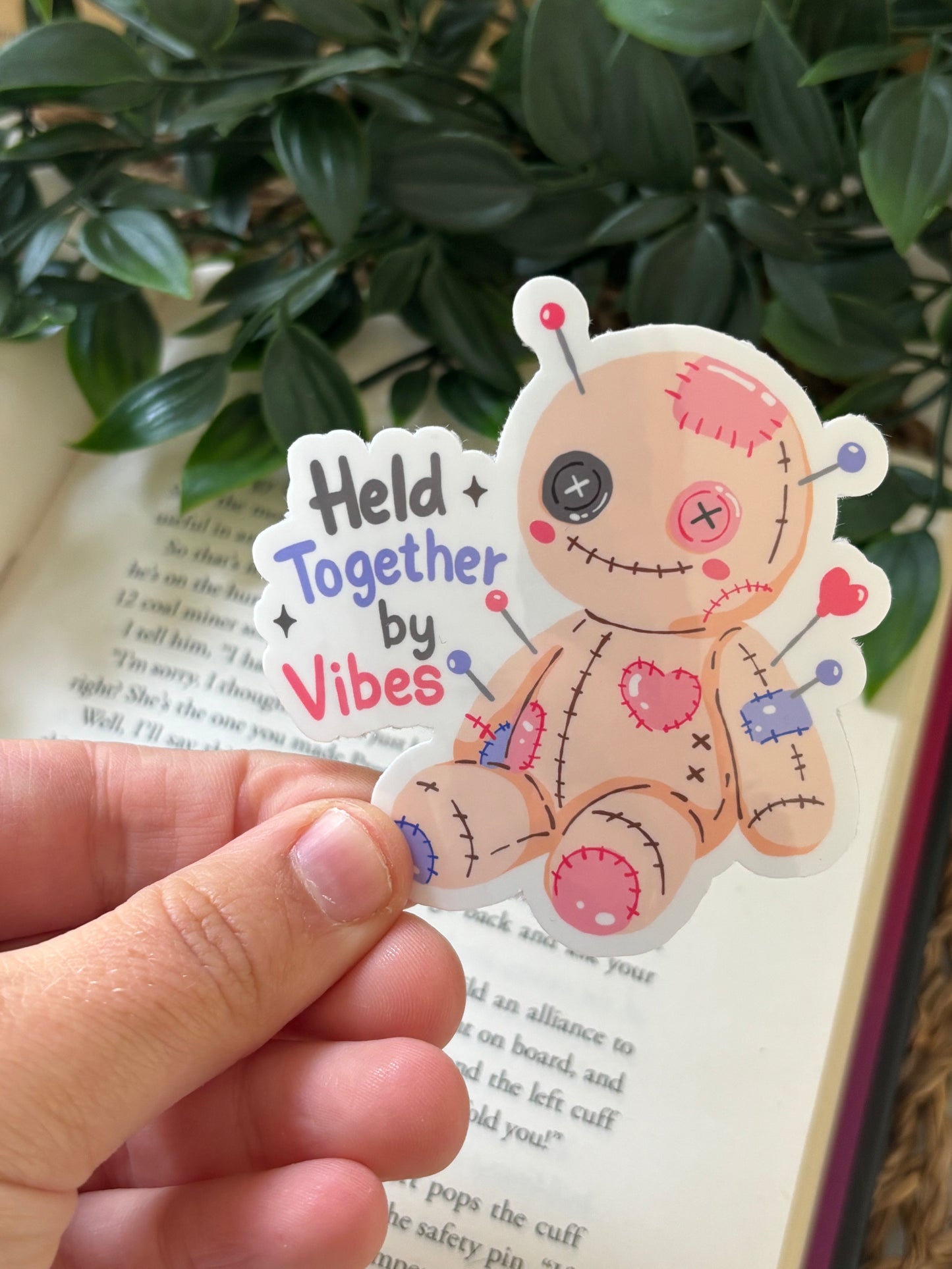 Held together by vibes sticker