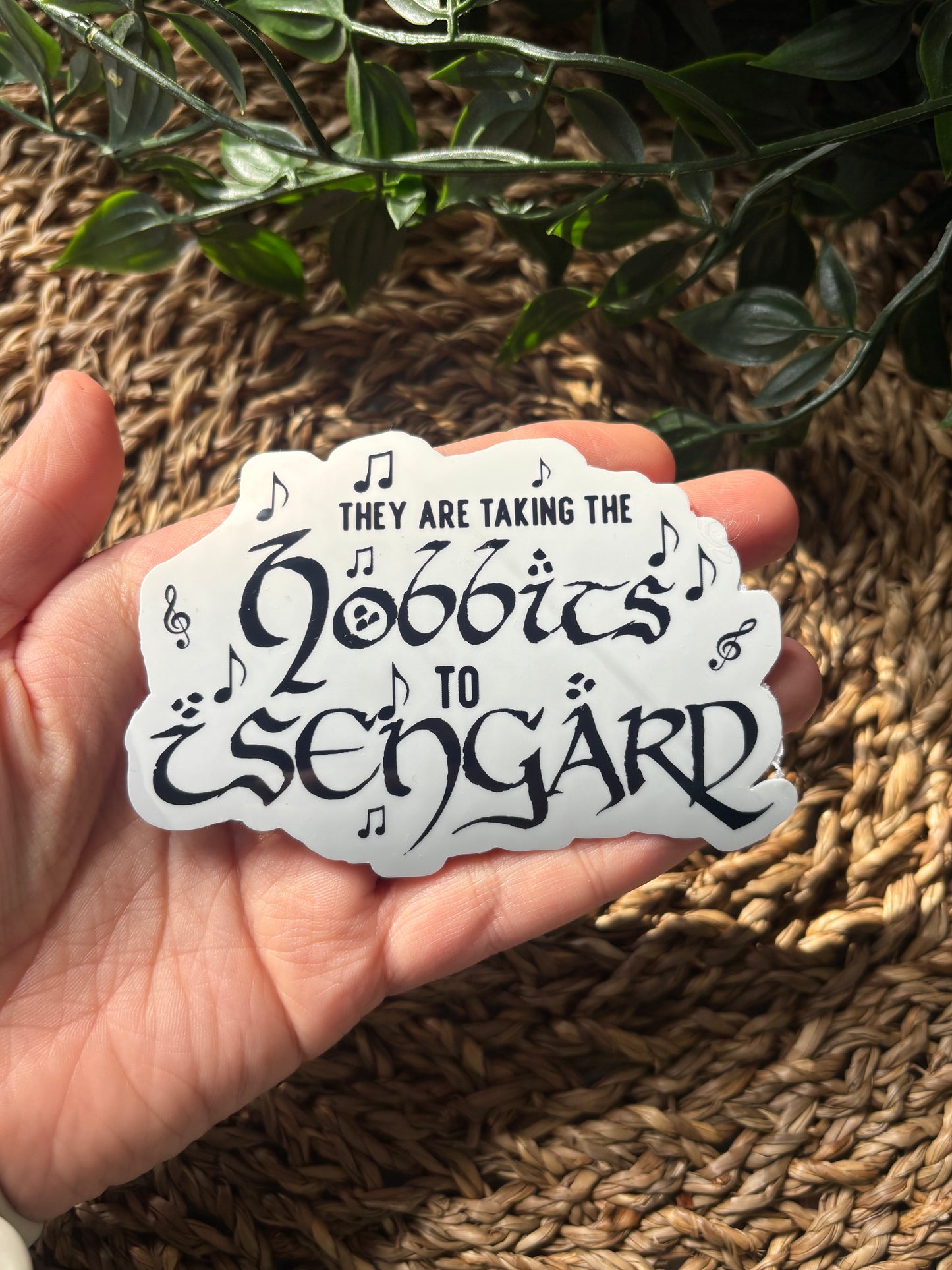 They are taking the hobbits sticker