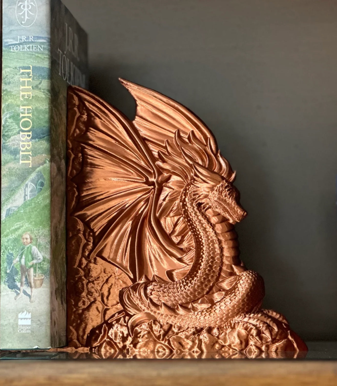 Bokstøtte - Kobberdrage