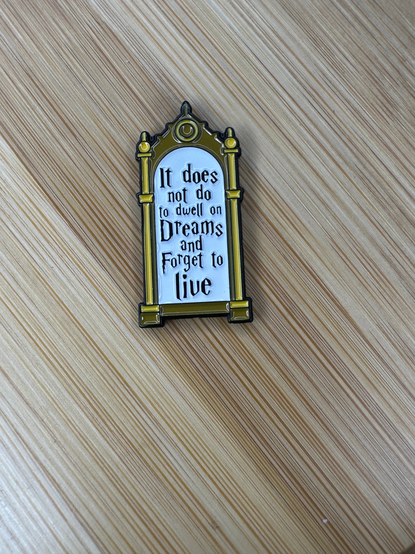 It Does Not Do to Dwell on Dreams and Forget to Live Pin