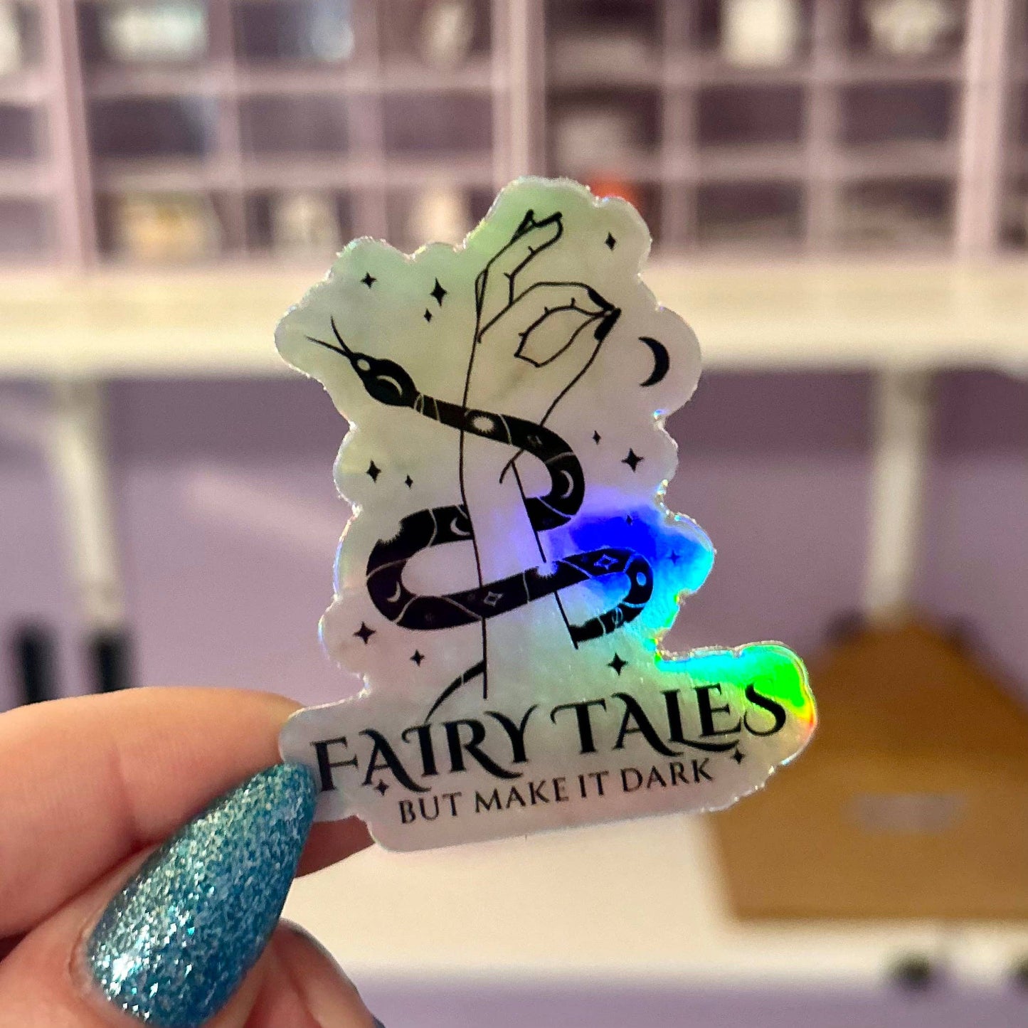 I Still Read Fairytales, but Make It Darker Holographic Sticker