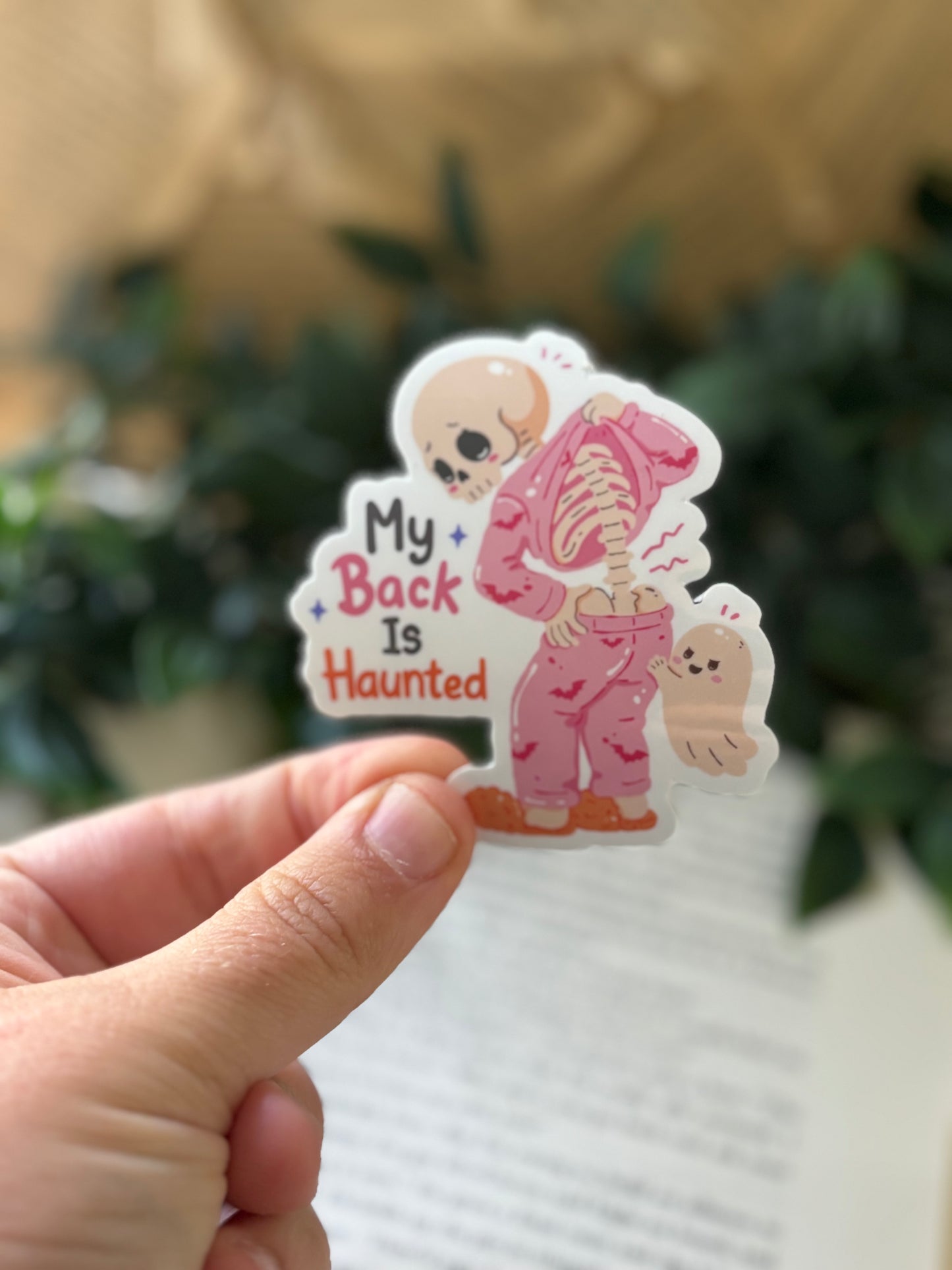 My back is haunted sticker
