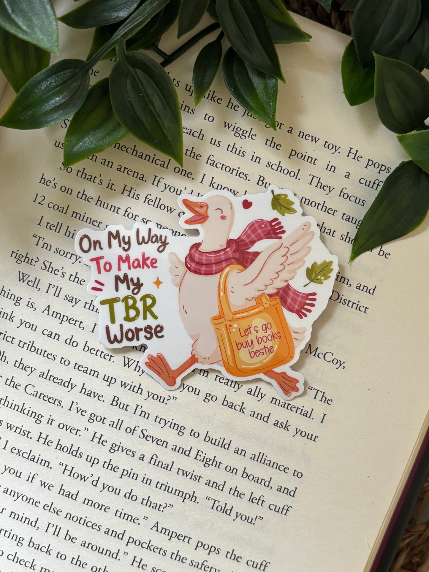 On my way to make my TBR worse Sticker