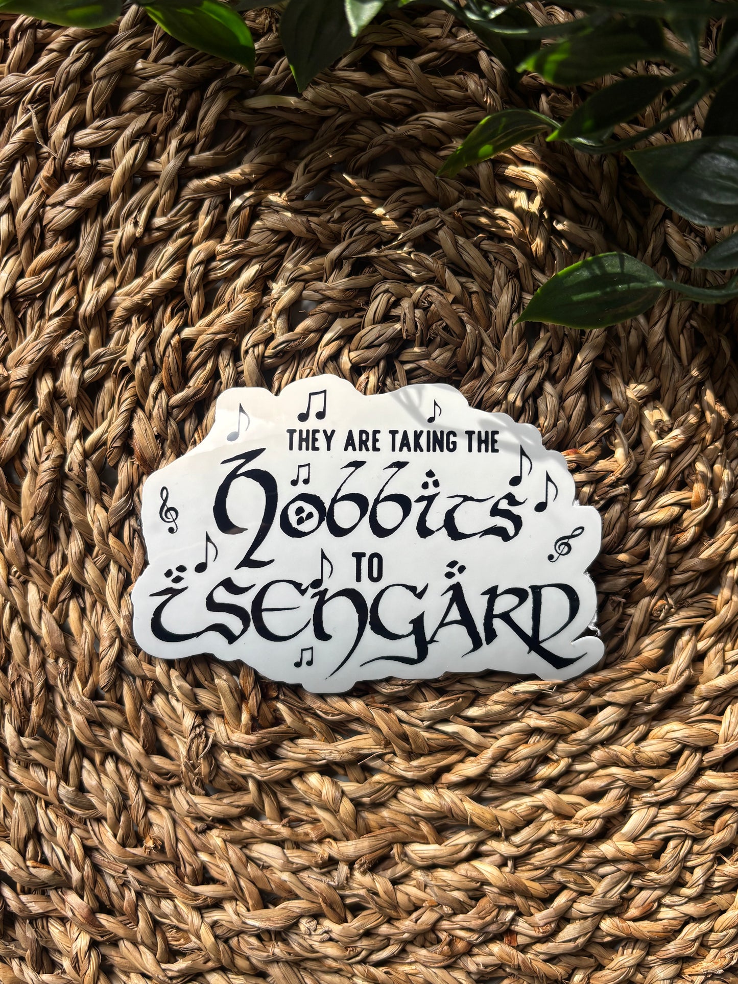 They are taking the hobbits sticker